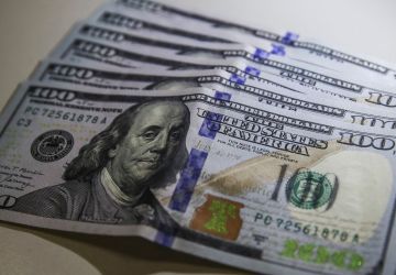 Dólar cai para R$ 6,04 em dia de posse de Trump