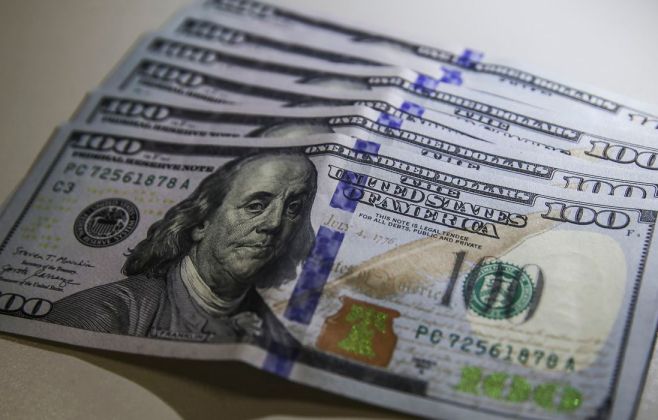 Dólar cai para R$ 6,04 em dia de posse de Trump